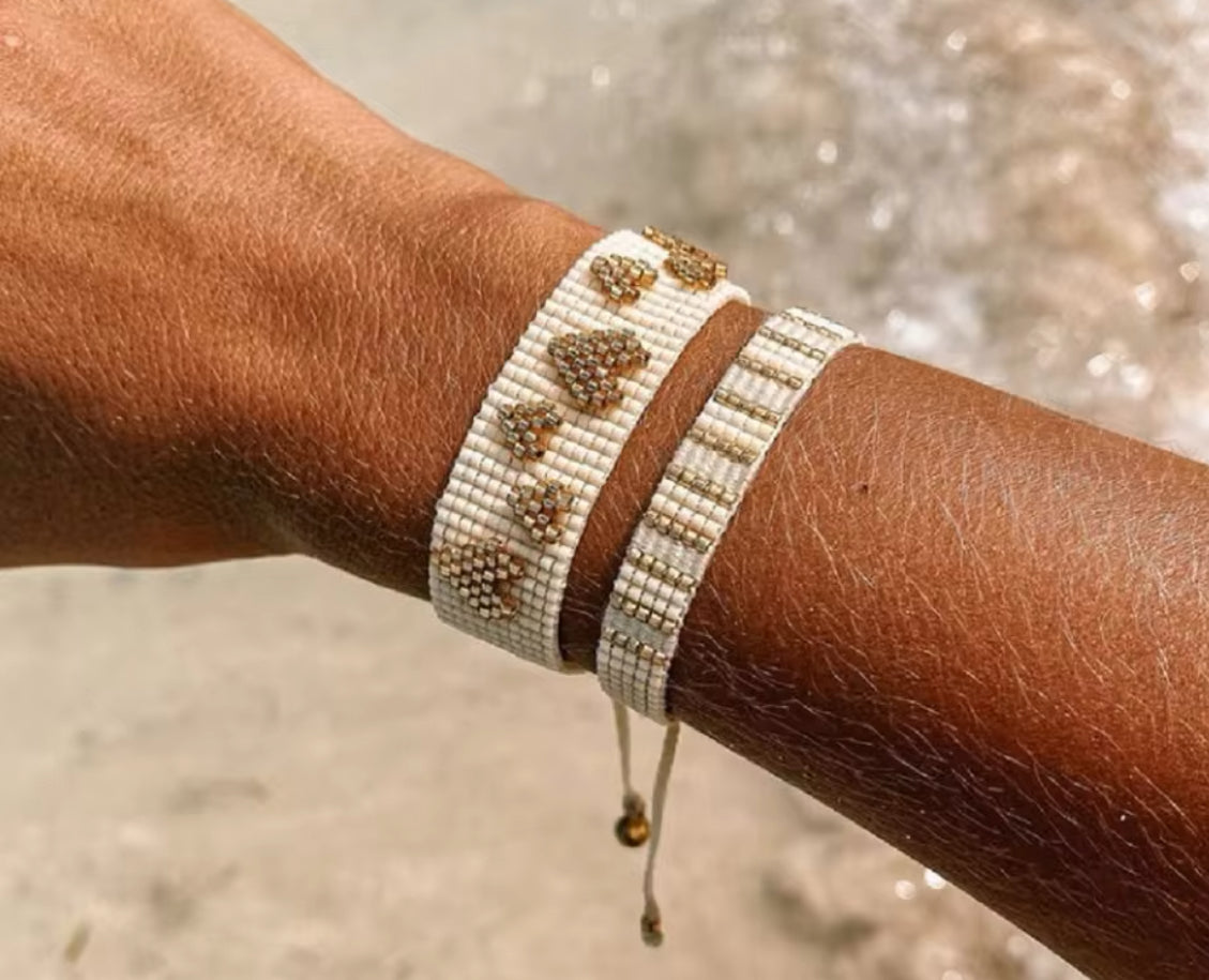SET pulseras tejidas arena